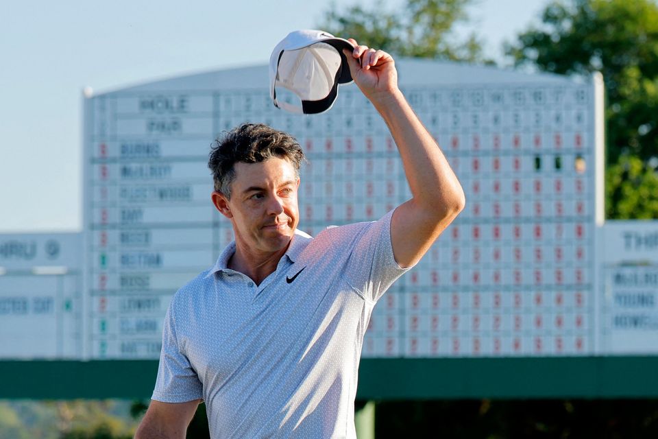 Rory McIlroy celebrates on the 18th hole